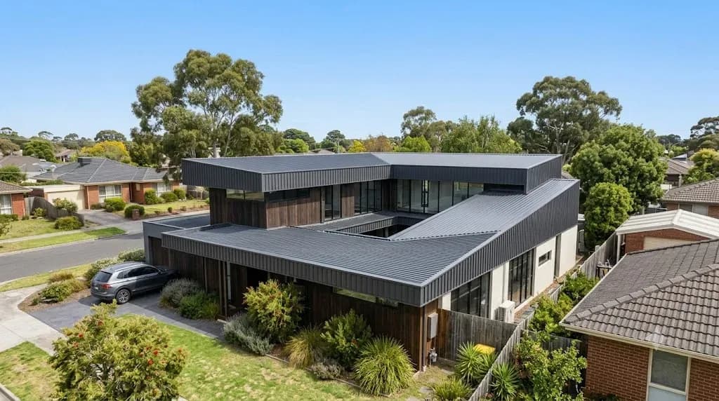 Tile to Colorbond roof conversion in Adelaide — new metal roofing sheets being installed
